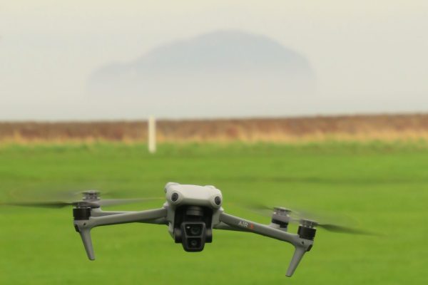 EDC DJI Air 3 with grass,field Bass Rock background in Scotland